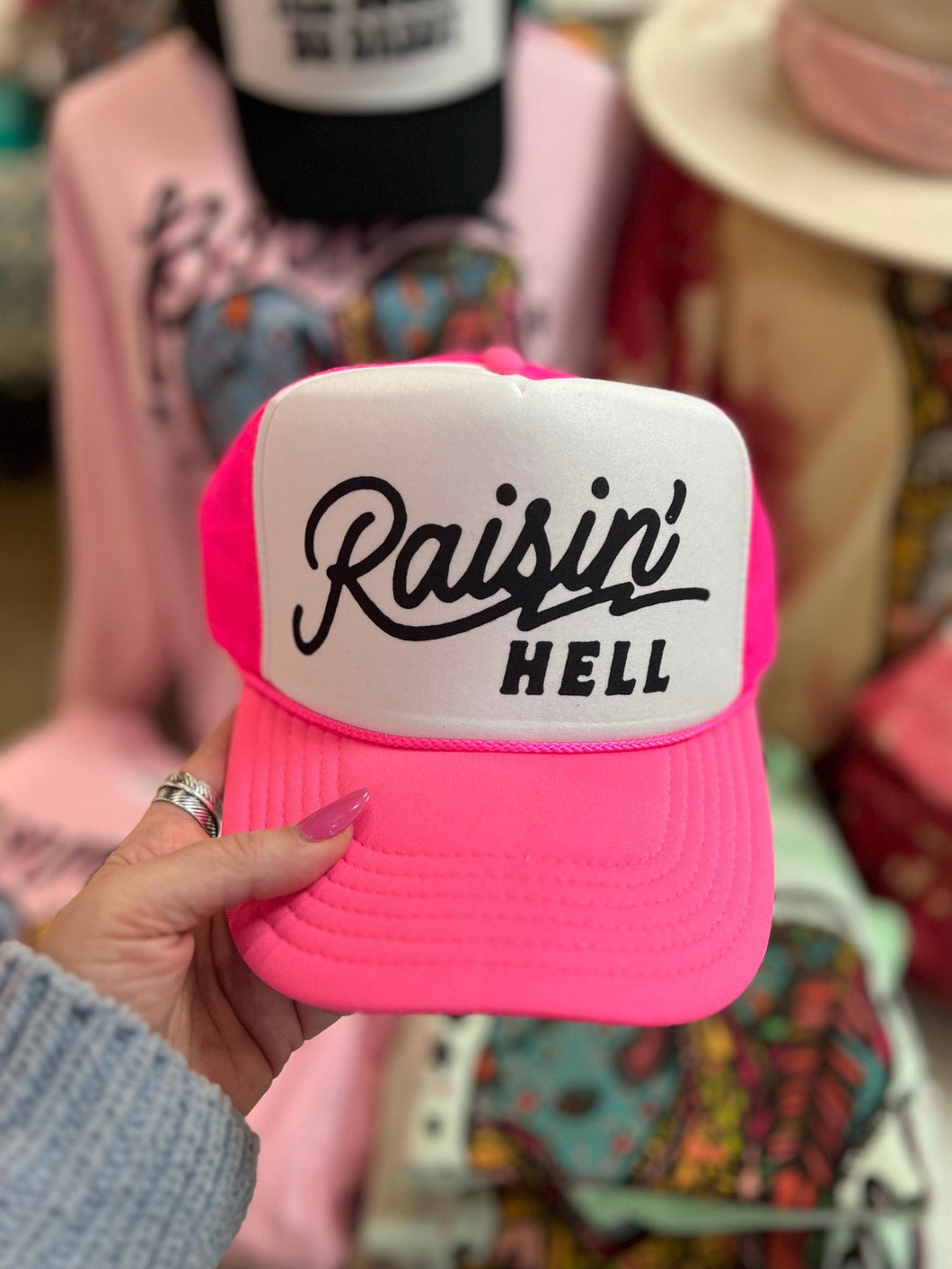 Raisin’ Hell Trucker Hat